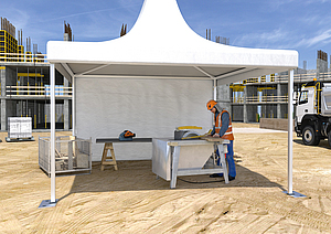 Ein Bauarbeiter arbeitet unter einem Wetterschutzzelt und wird vor starker Sonnenbestrahlung geschützt.