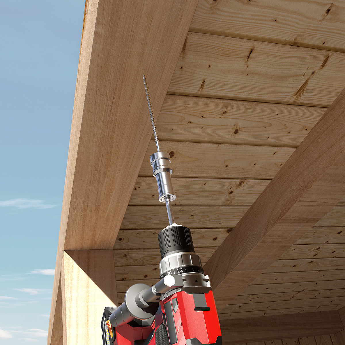 Eine Einschraubhilfe stabilisiert eine lange Holzbauschraube, die mit einem Akkuschrauber senkrecht in eine Holzdecke eingedreht wird.